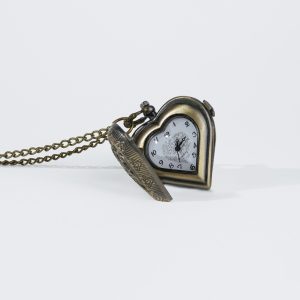 A beautifully crafted Heart & Watch Pendant symbolizing eternal love and timeless elegance
